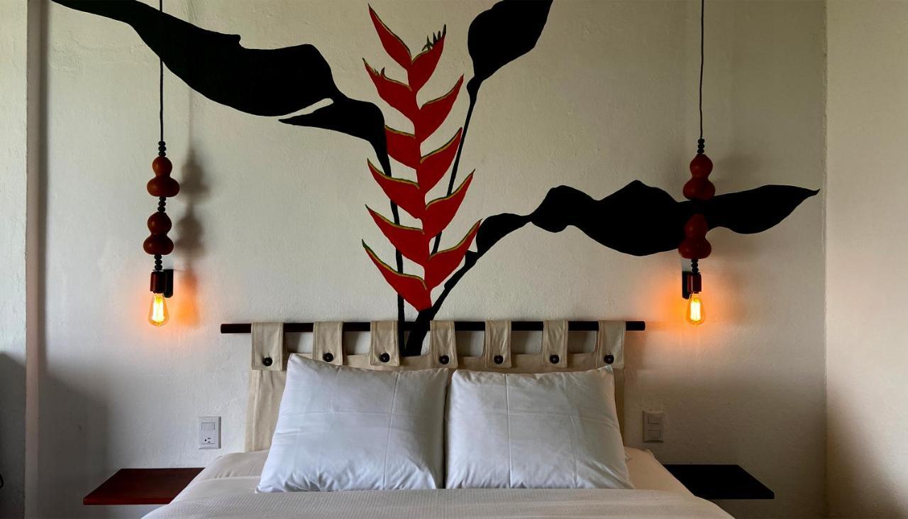 Hotel Maya Internacional Flores Exterior photo